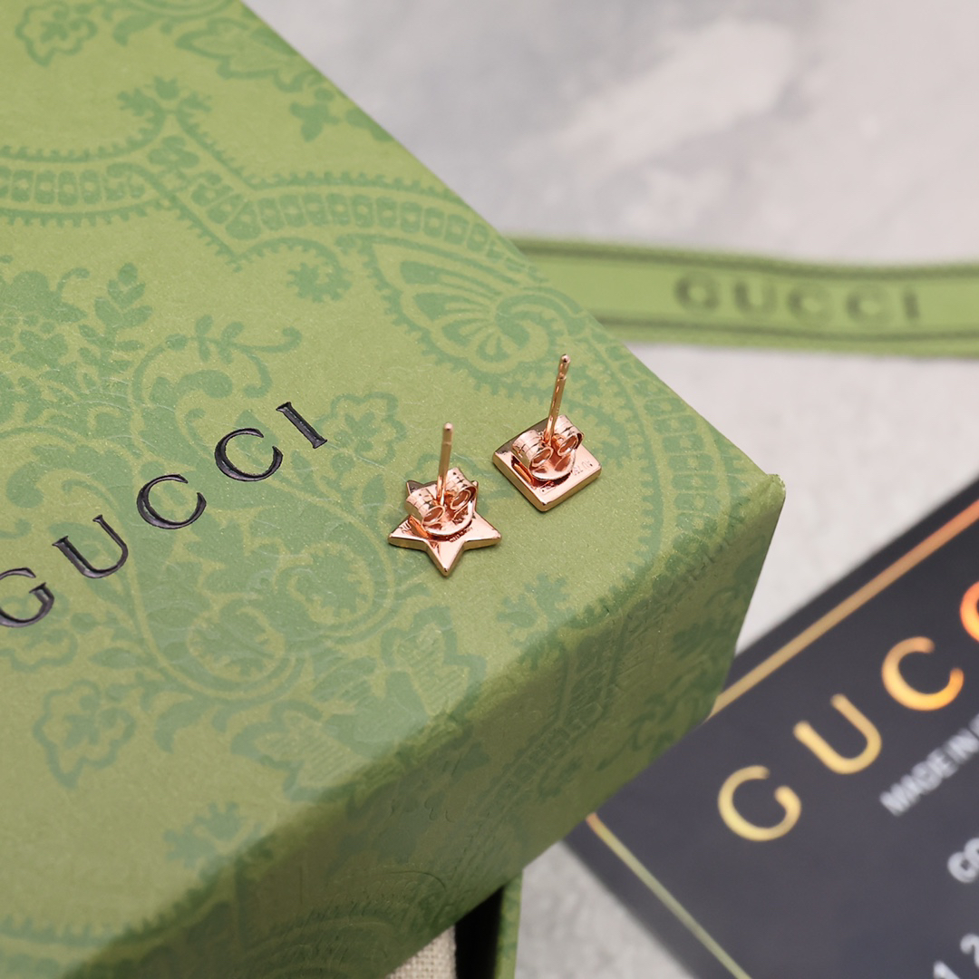 GUCCi five-pointed star earrings