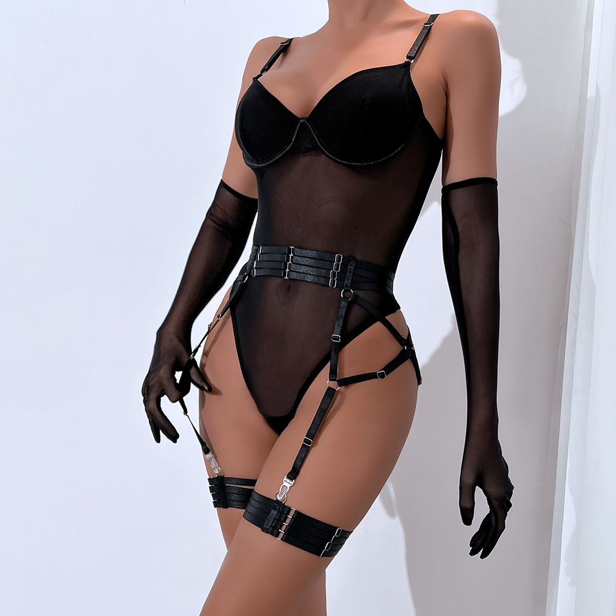 Women's lace mesh sexy lingerie with strappy design and slim fit.
