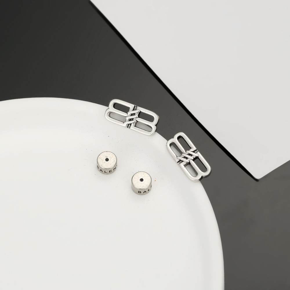 Balenciaga BB distressed earrings