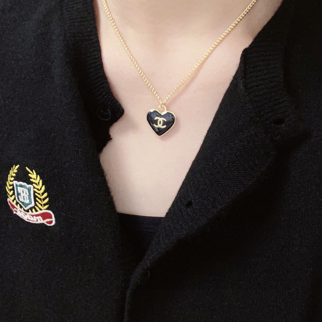 Chanel black heart double-sided necklace