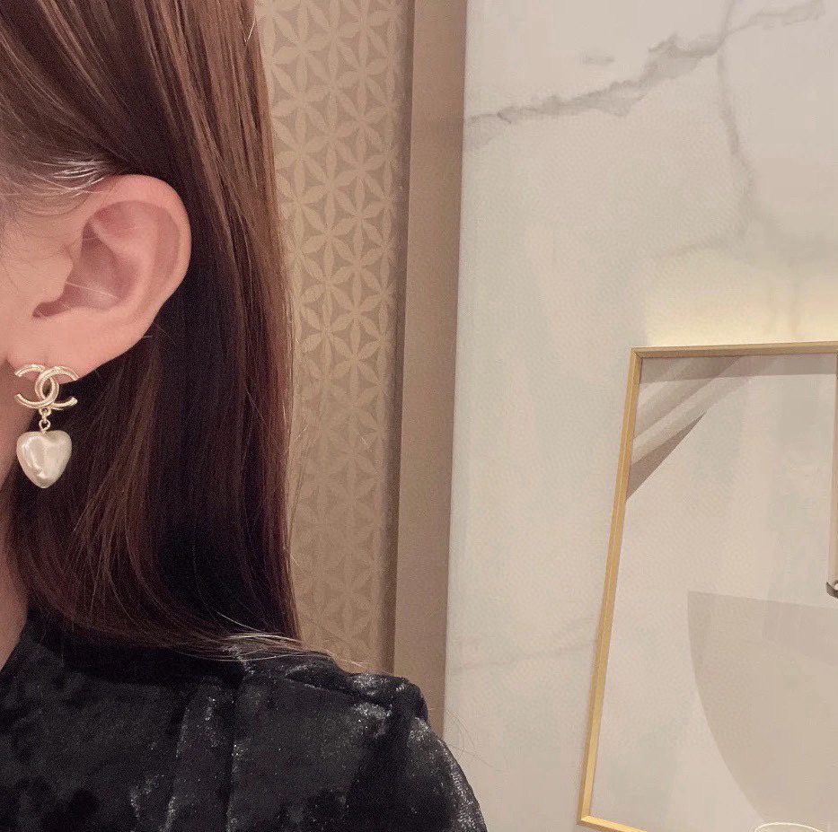 Chanel light gold heart earrings