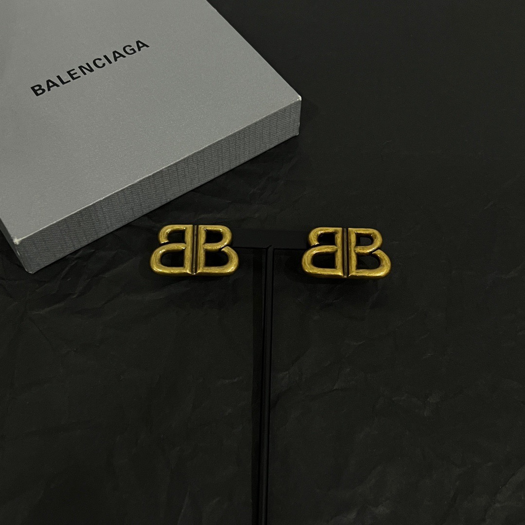 Balenciaga BB distressed earrings