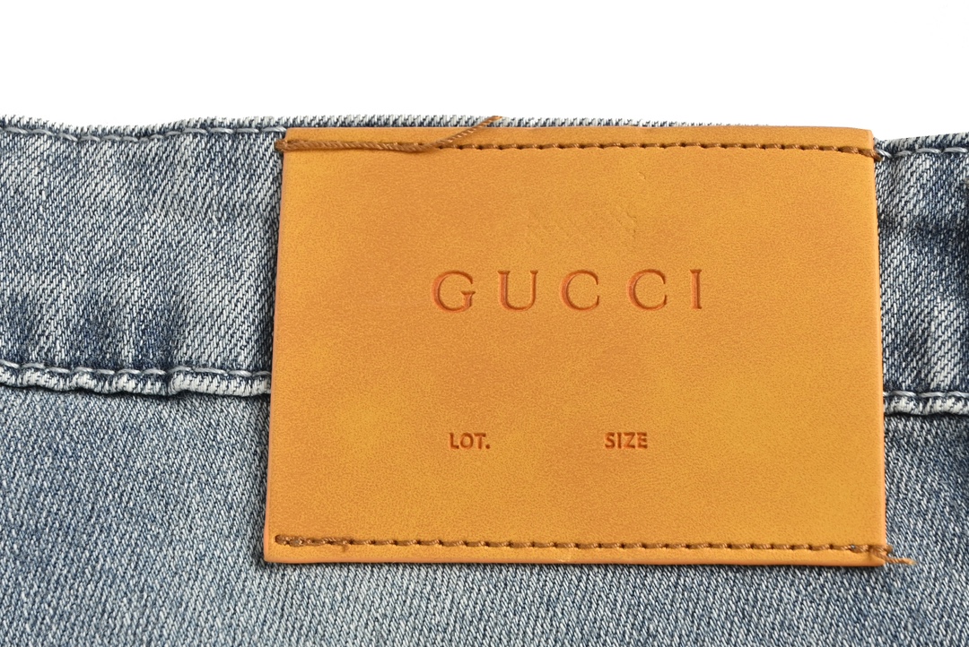 Gucci & The North face co-branded embroidered logo jeans