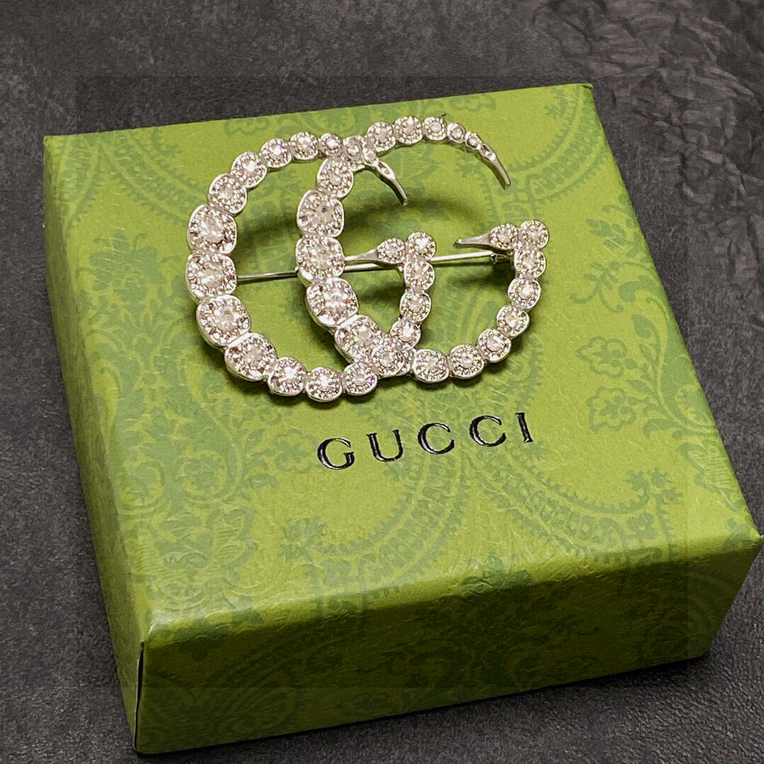 Gucci GG diamond brooch