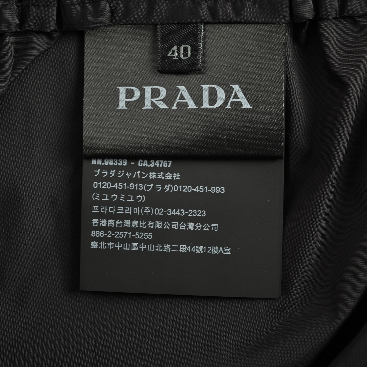 Prada 25ss printed logo nylon shorts