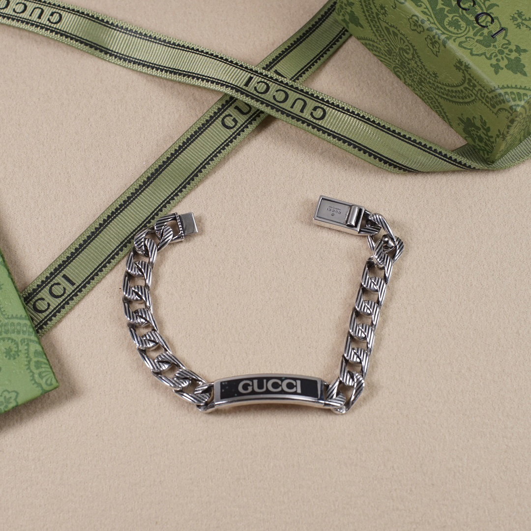Gucci hand brand distressed bracelet