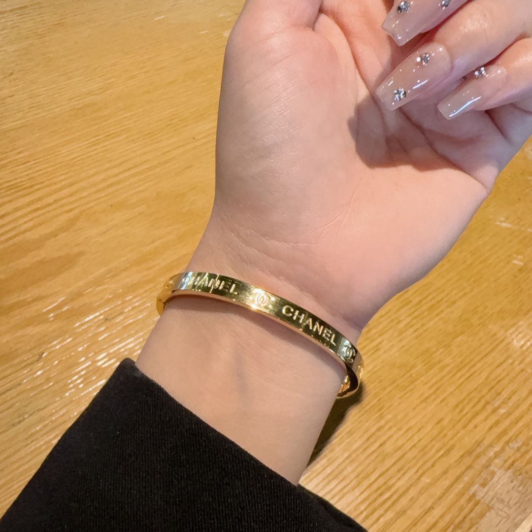 Chanel Medium Engraved Letter Bracelet