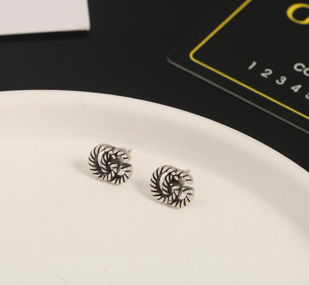 GUCCi GG distressed earrings
