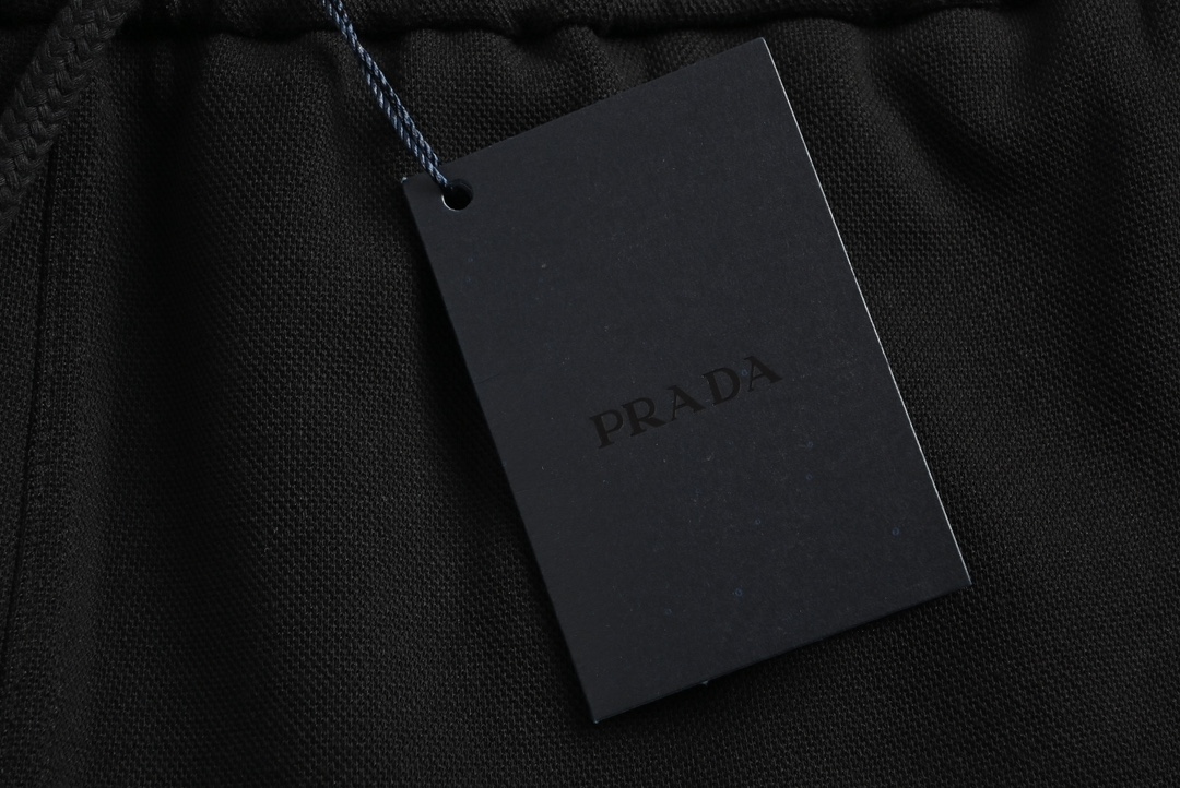 Prada 23Fw triangle logo patchwork suit trousers