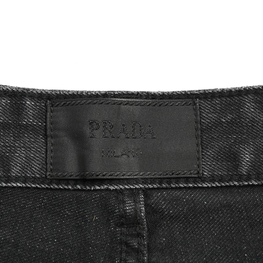 Prada 23Fw washed jeans with triangle logo embroidery