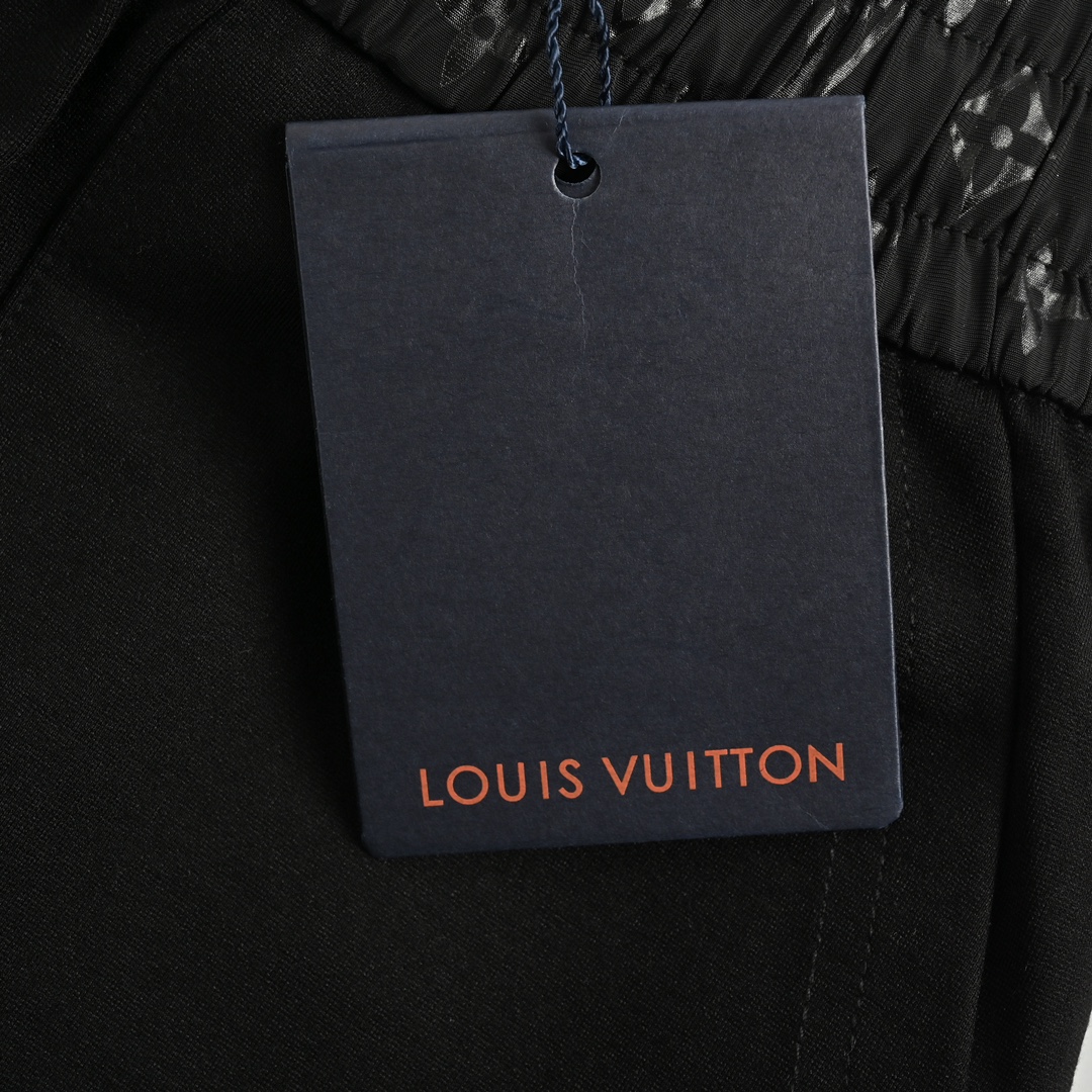 Louis Vuitton catwalk trousers with embroidered logo
