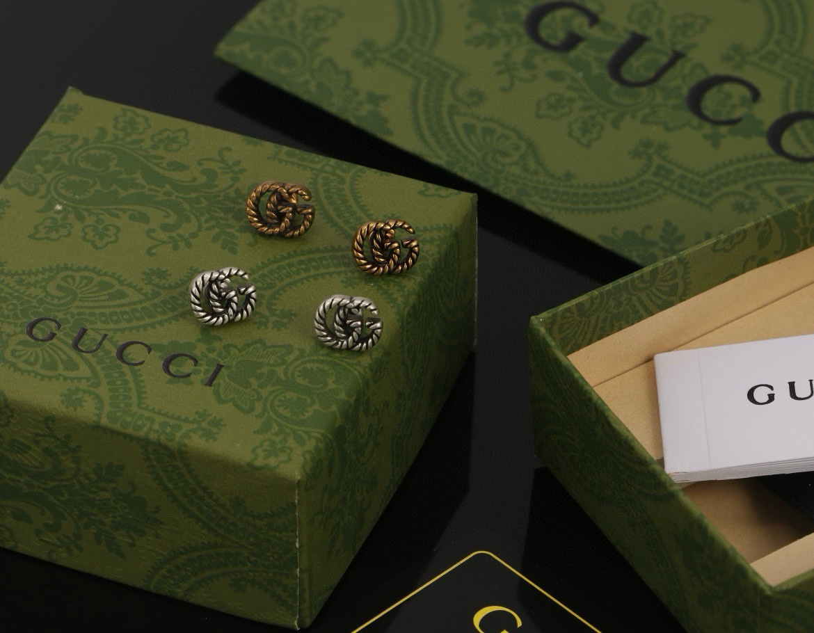 GUCCi GG distressed earrings