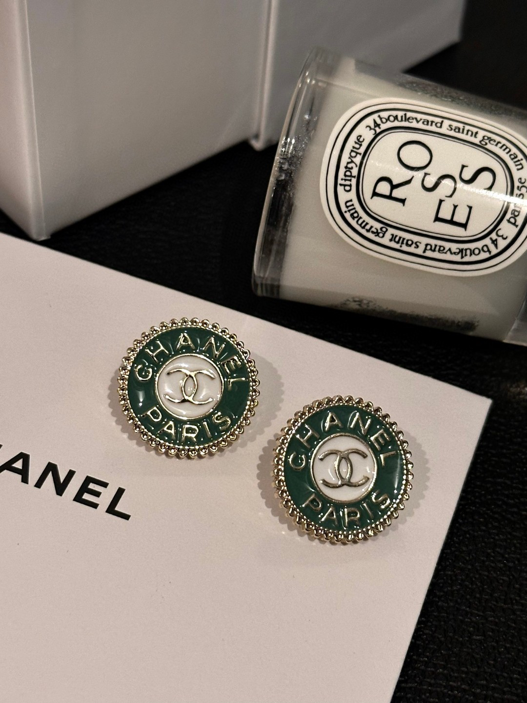 Chanel two-tone badge earrings