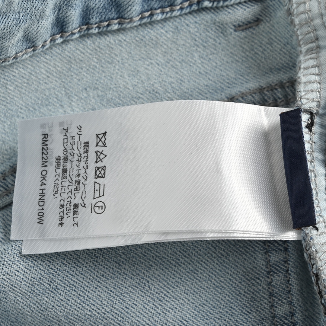 Louis Vuitton Inverted letter print jeans