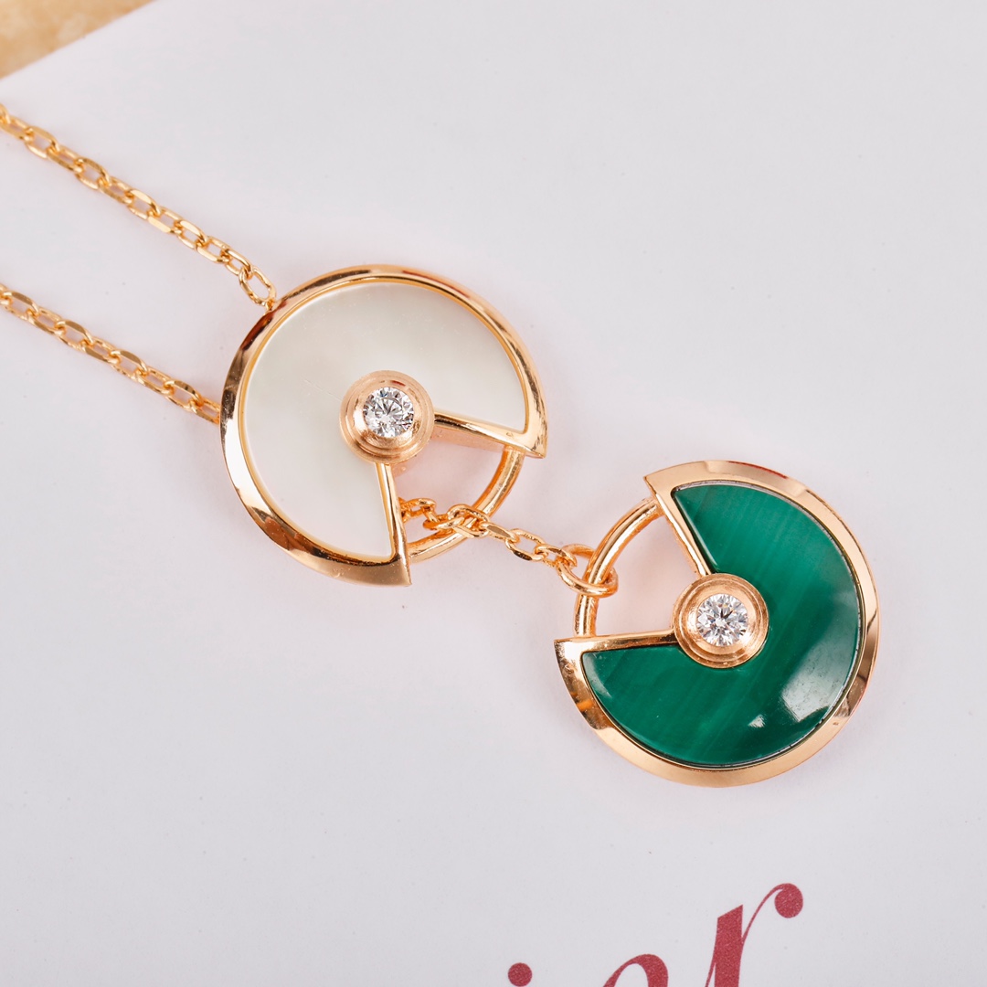 Cartier long chain amulet necklace