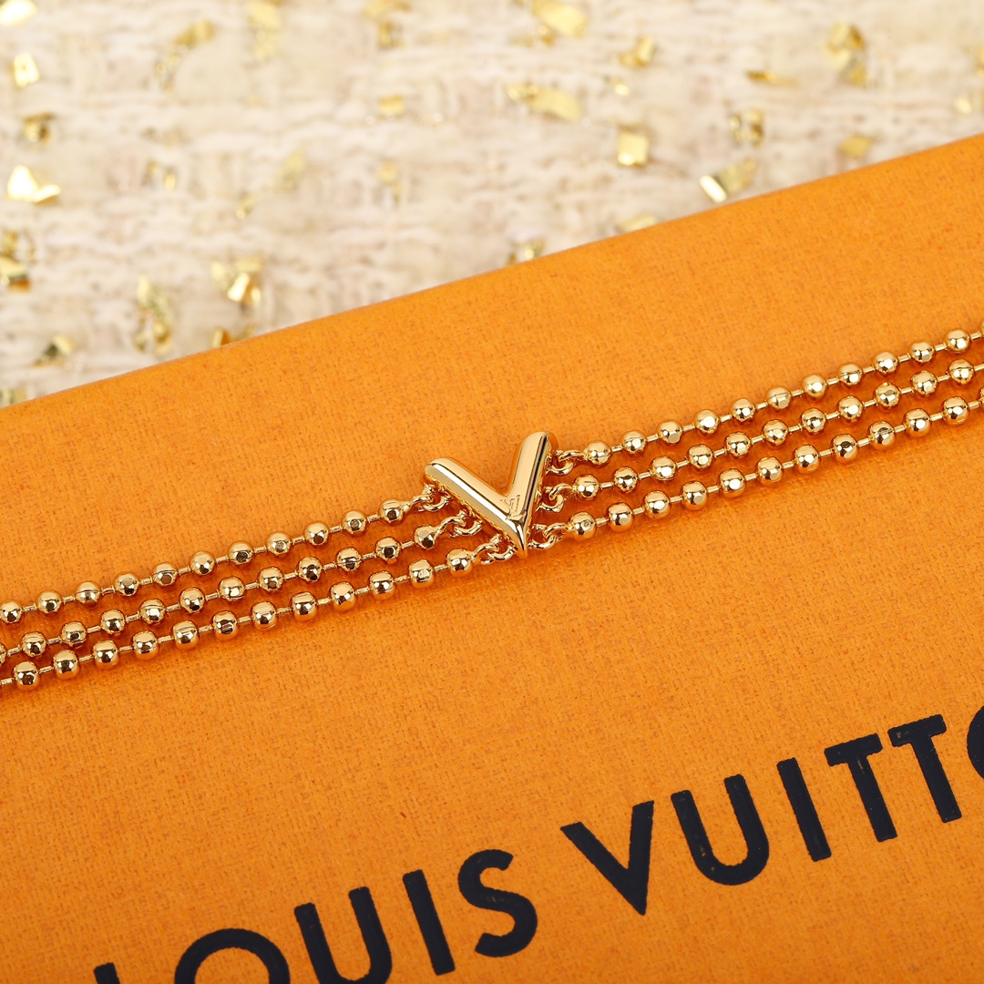 Louis Vuitton triple bead necklace