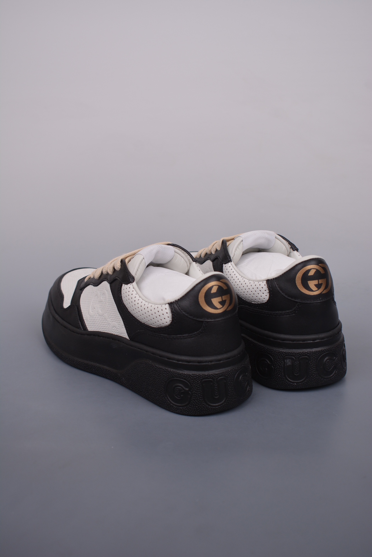 GUCCI punching black and white panda GG printed embossed