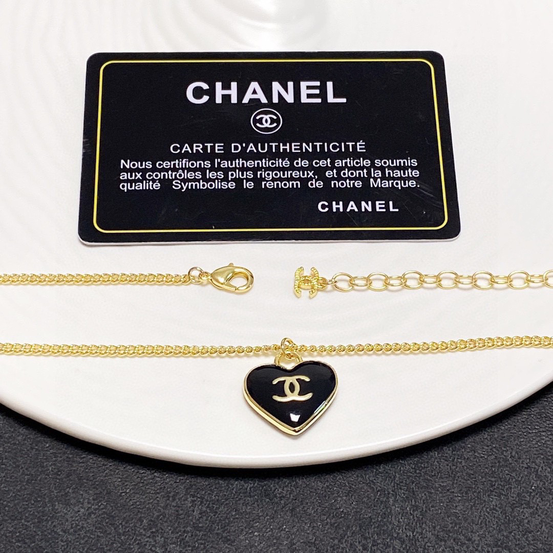 Chanel black heart double-sided necklace