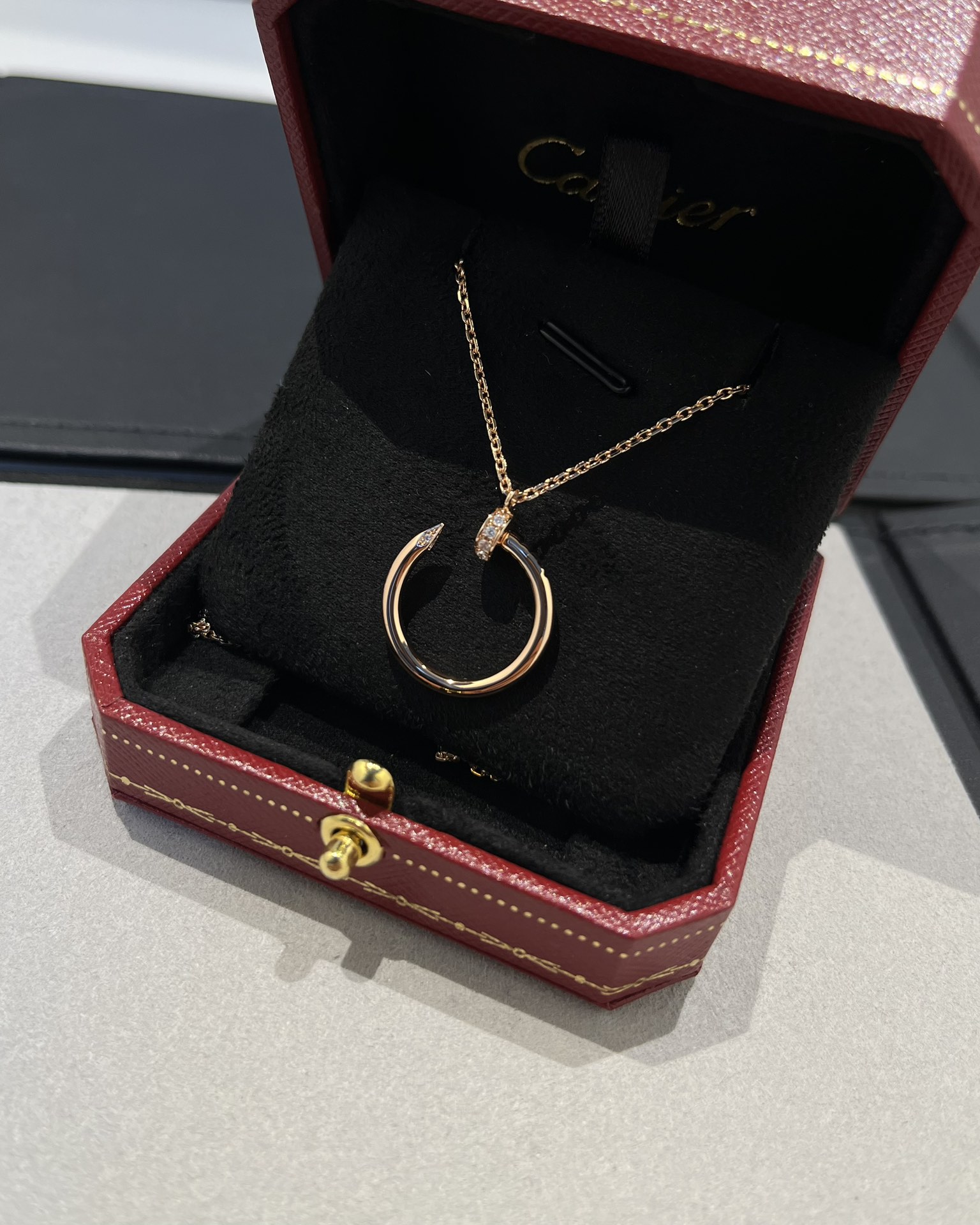 Cartier head and tail diamond nail necklace