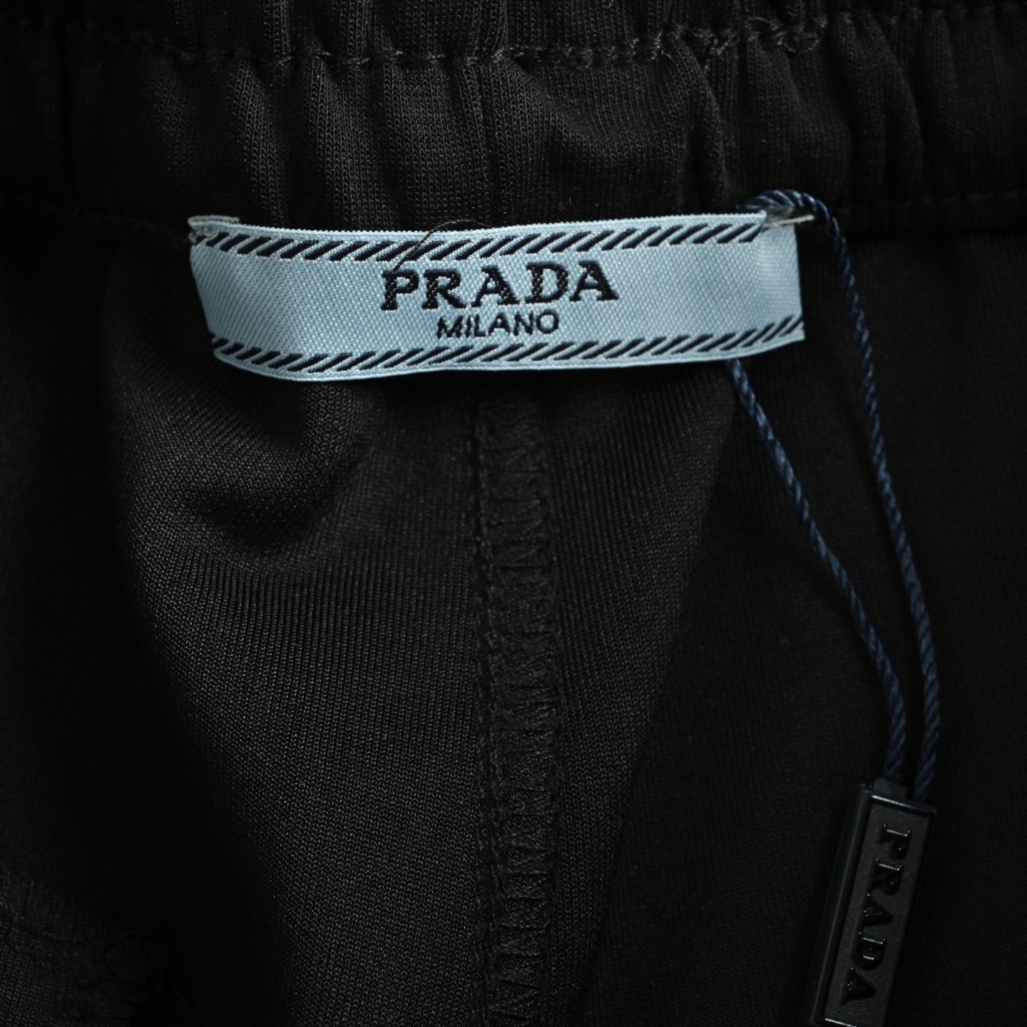 Prada 25ss triangle red rubber logo shorts