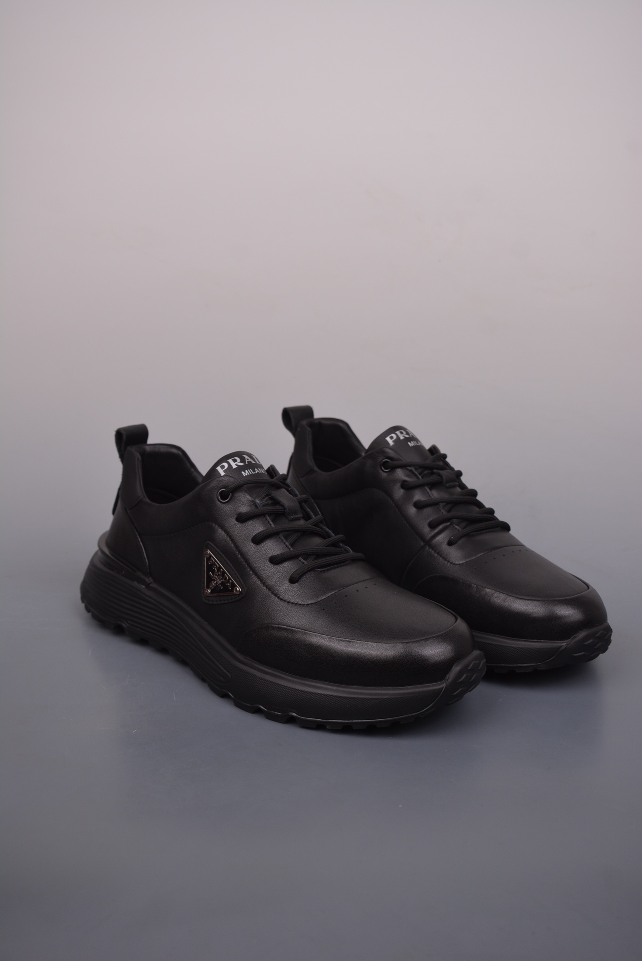 Prada PRAX 01 Triangle Logo Leather Sneakers glossy black 3D936M_3LF5_FG00