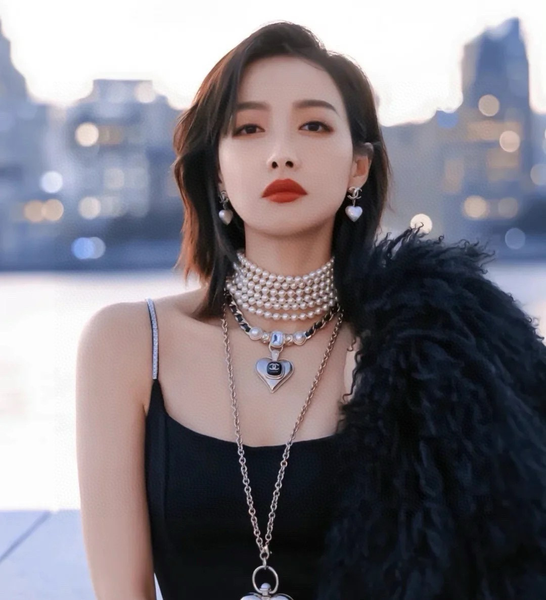 Chanel light gold heart earrings