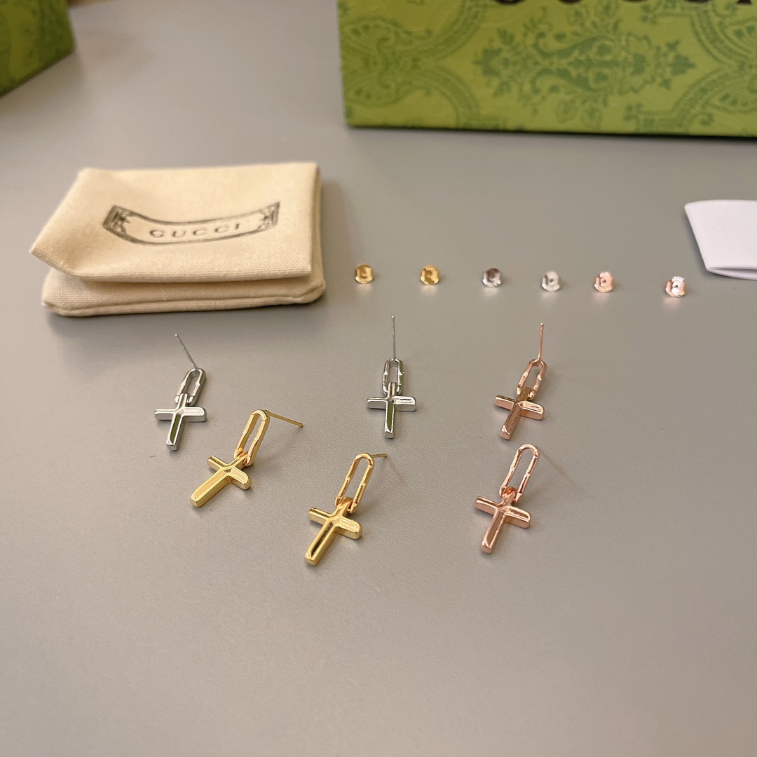 GUCCi cross earrings