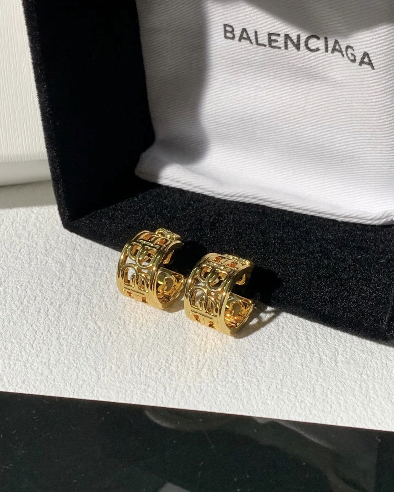 Balenciaga BB hollow gold earrings