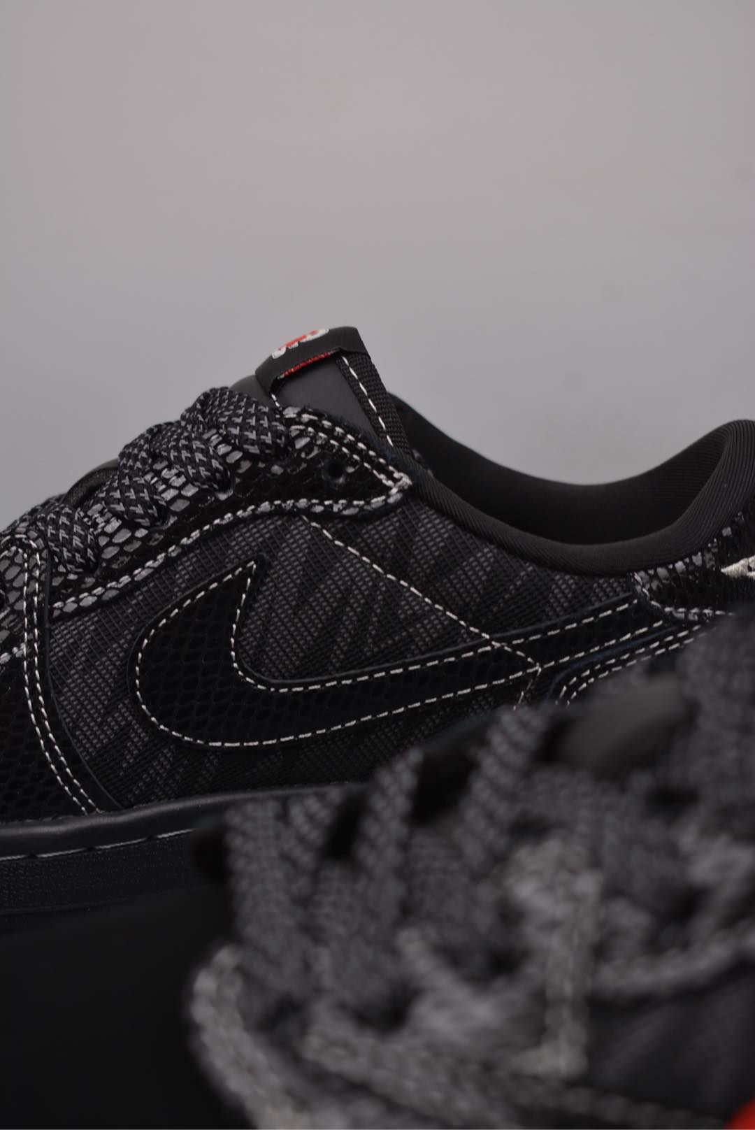 Travis Scott x Nike Air Jordan 1 Low Year of the Snake black and red CH6336-018