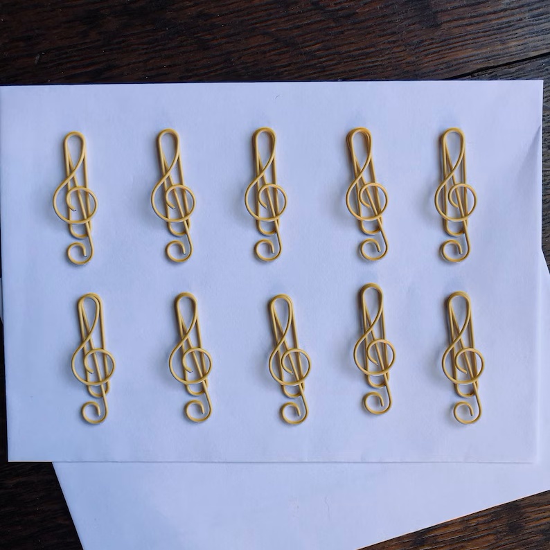 A set of 10 high quality music treble clef colored metal paper clips