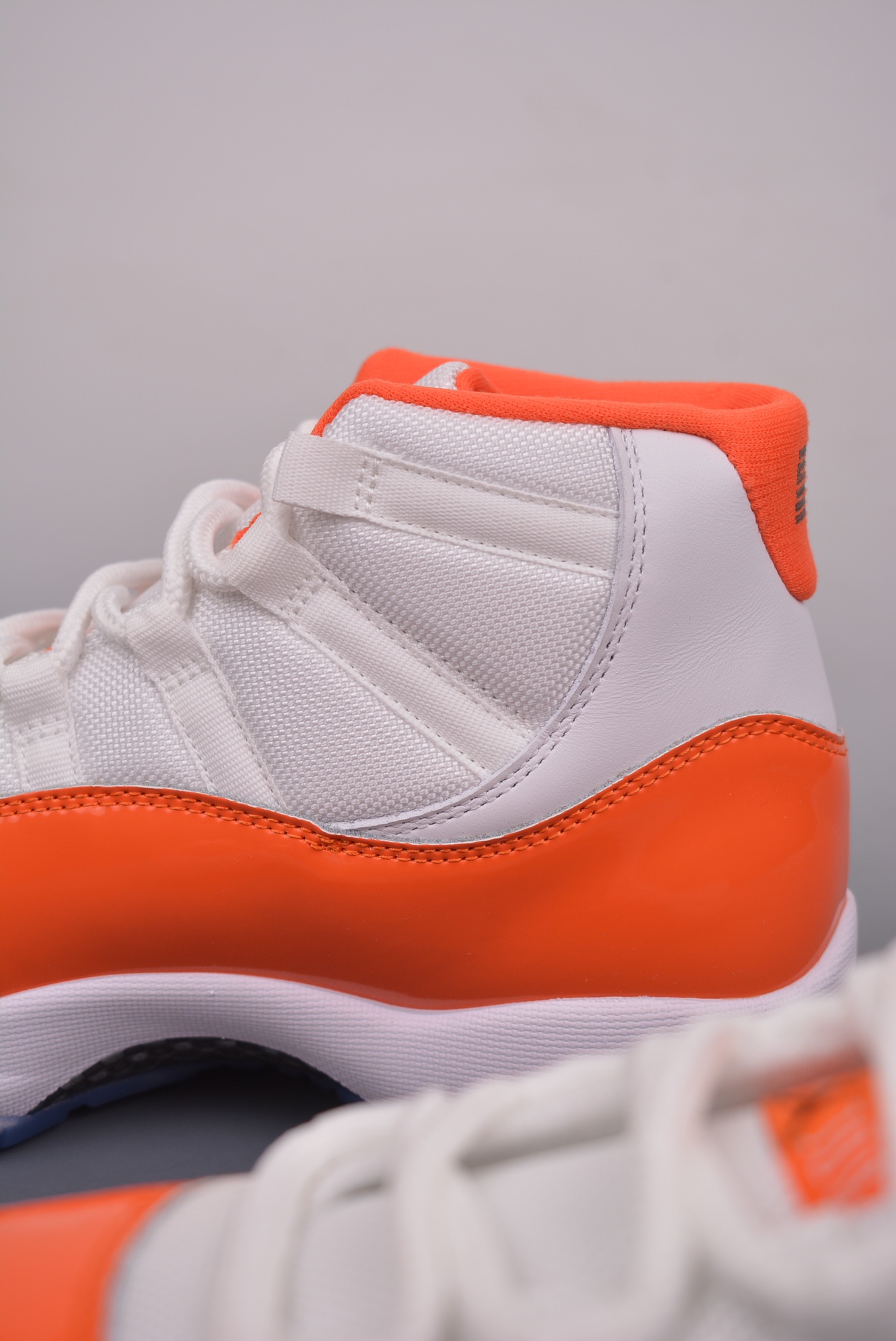 Air Jordan 11 Retro White and Orange 378037-002