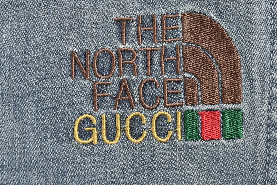 Gucci & The North face co-branded embroidered logo jeans