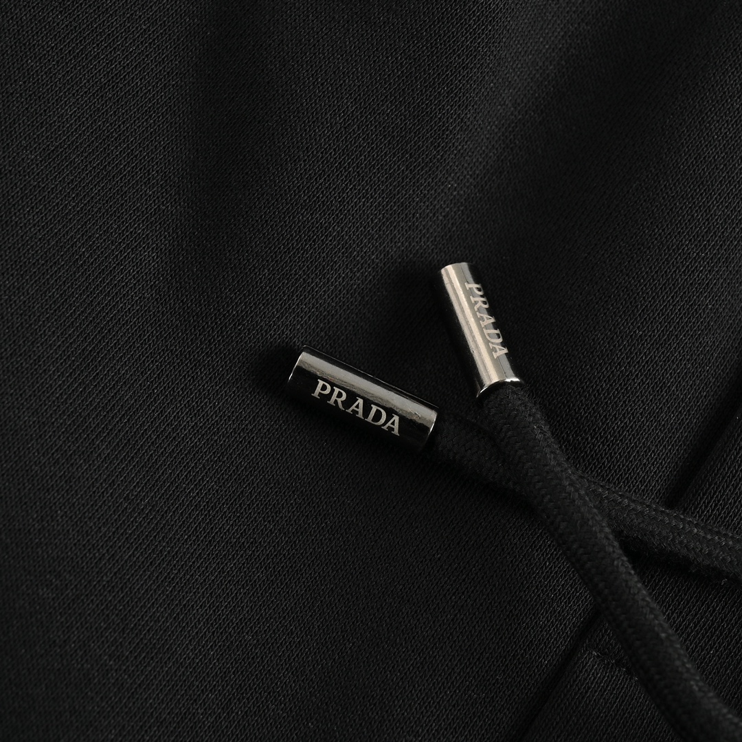 Prada embroidered logo trousers
