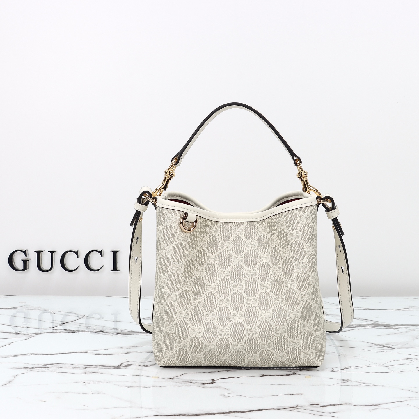 Gucci GG Emblem small bucket bag ‎815118 FAD6L 9641