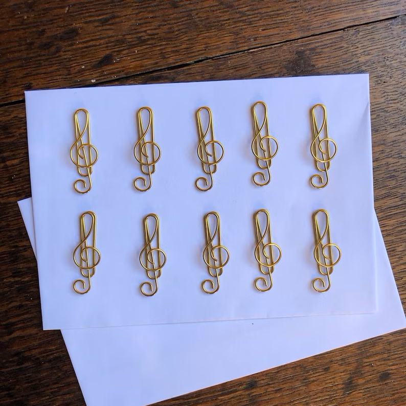 A set of 10 high quality music treble clef colored metal paper clips