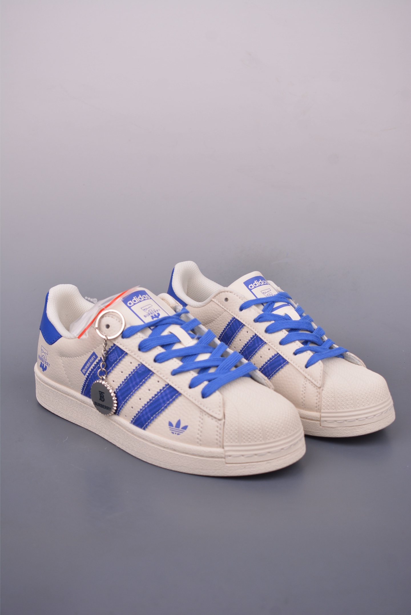 Burberry x Adidas Originals Superstar sneakers Off-white and blue AD0002