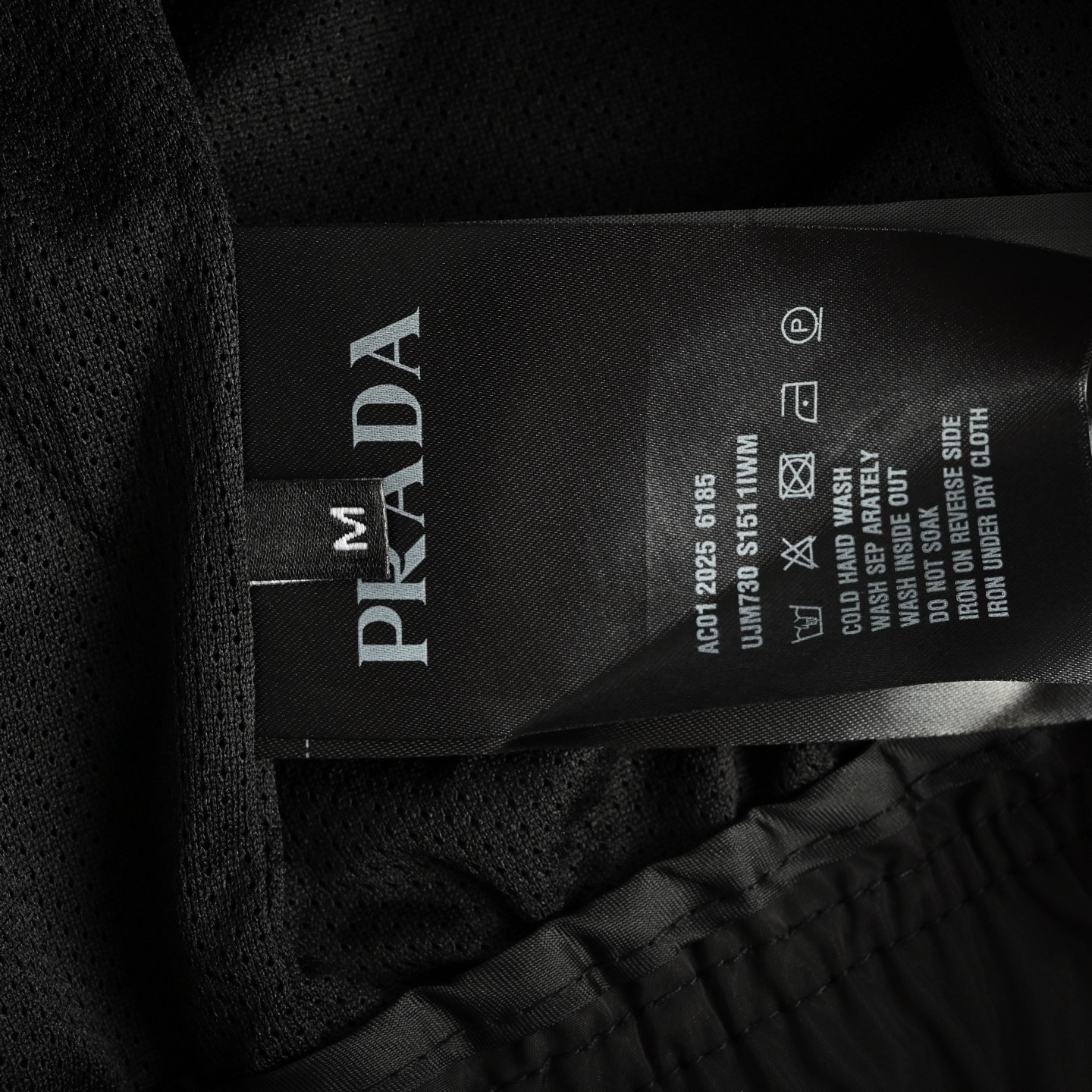 Prada 25ss triangle logo zip pocket nylon shorts