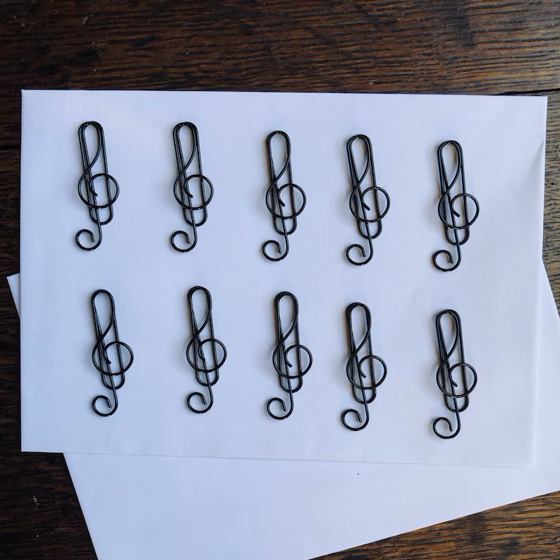 A set of 10 high quality music treble clef colored metal paper clips