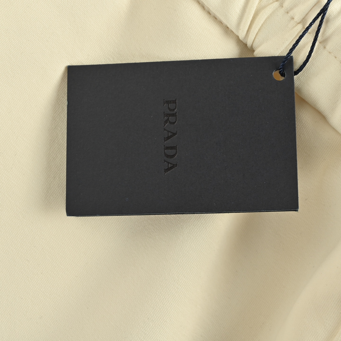 Prada 25ss metal triangle logo side pocket cargo shorts