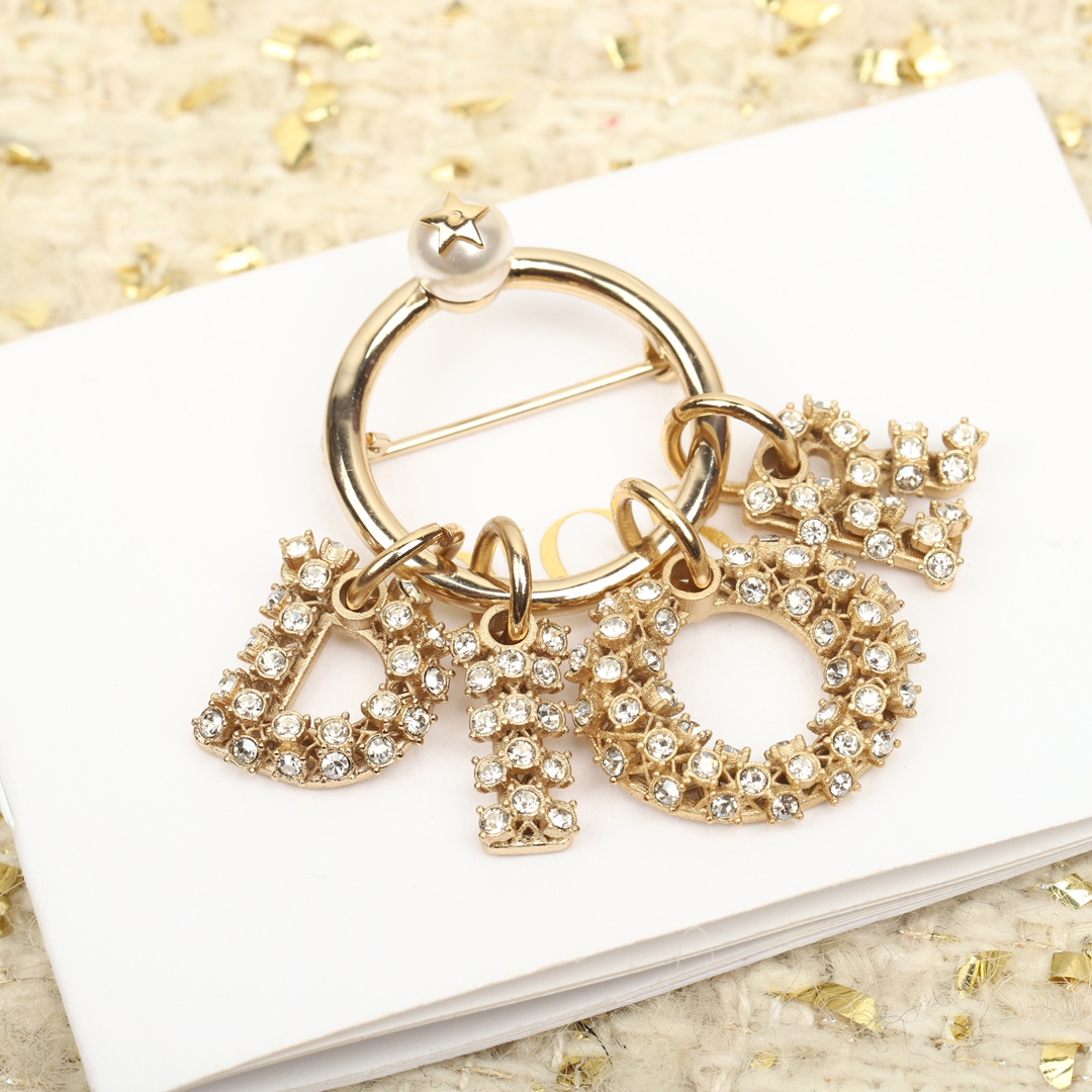 Dior diamond letter brooch