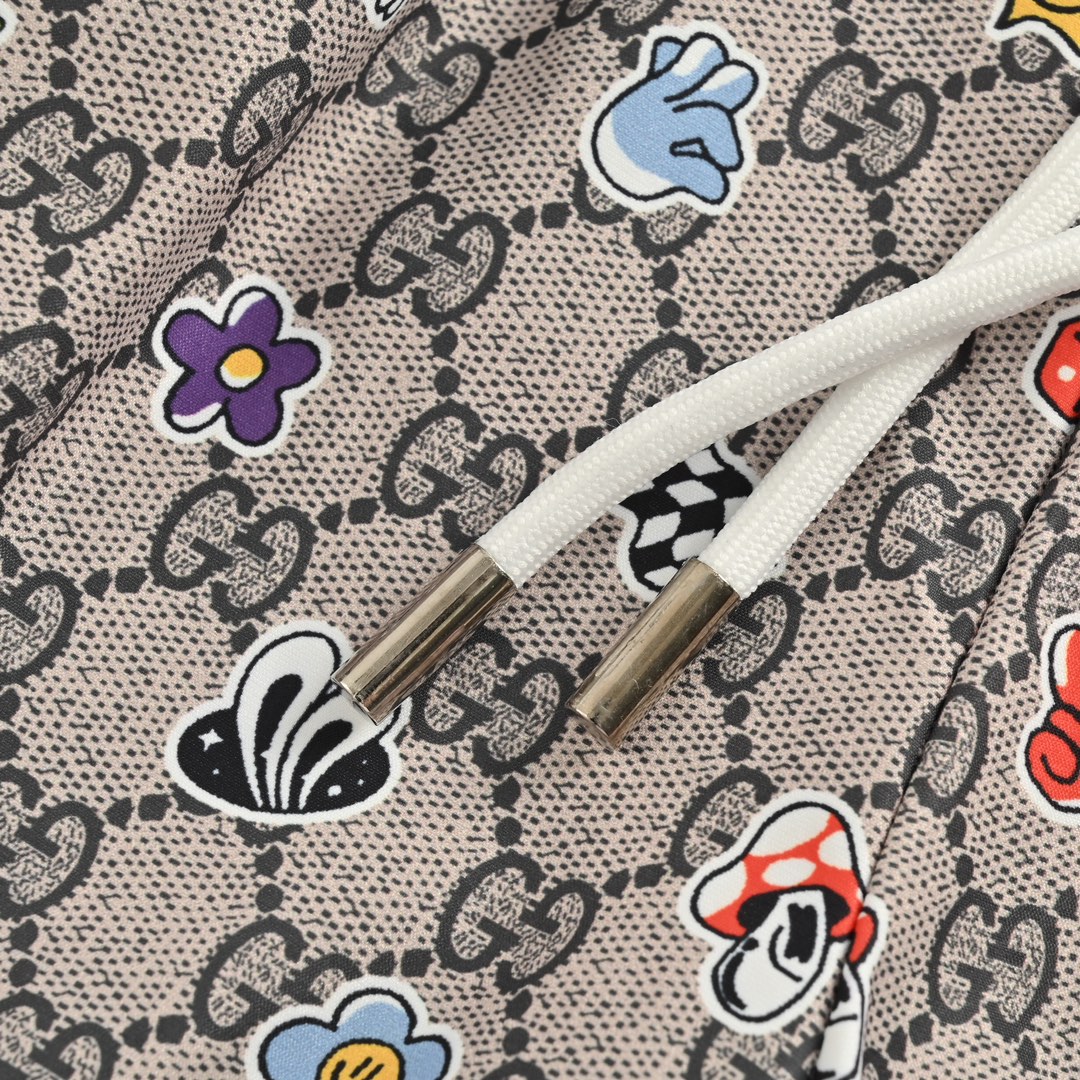 Gucci 24ss all over printed double G cartoon element beach shorts