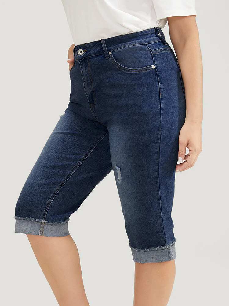 Moderately Stretchy Roll Hem Ripped Knee Denim Shorts