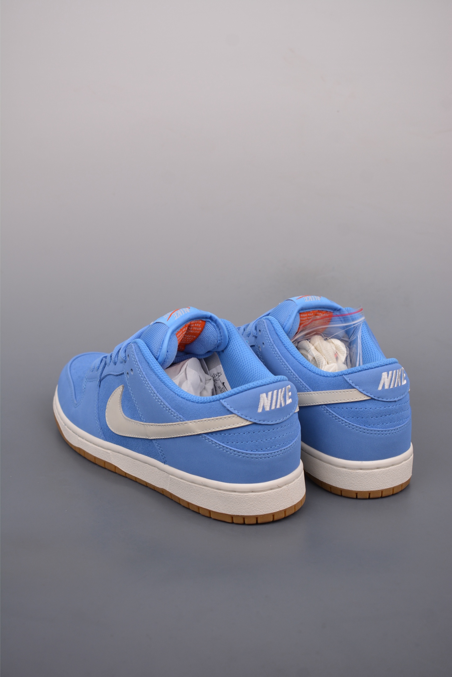 Nike SB Dunk Low Retro Sneakers Blue White Logo FJ1674-401