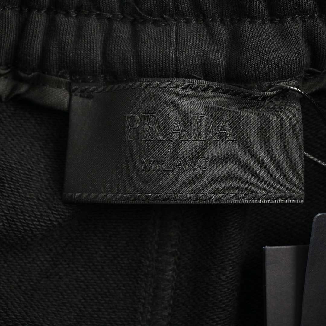Prada 24Fw back pocket toothbrush logo trousers