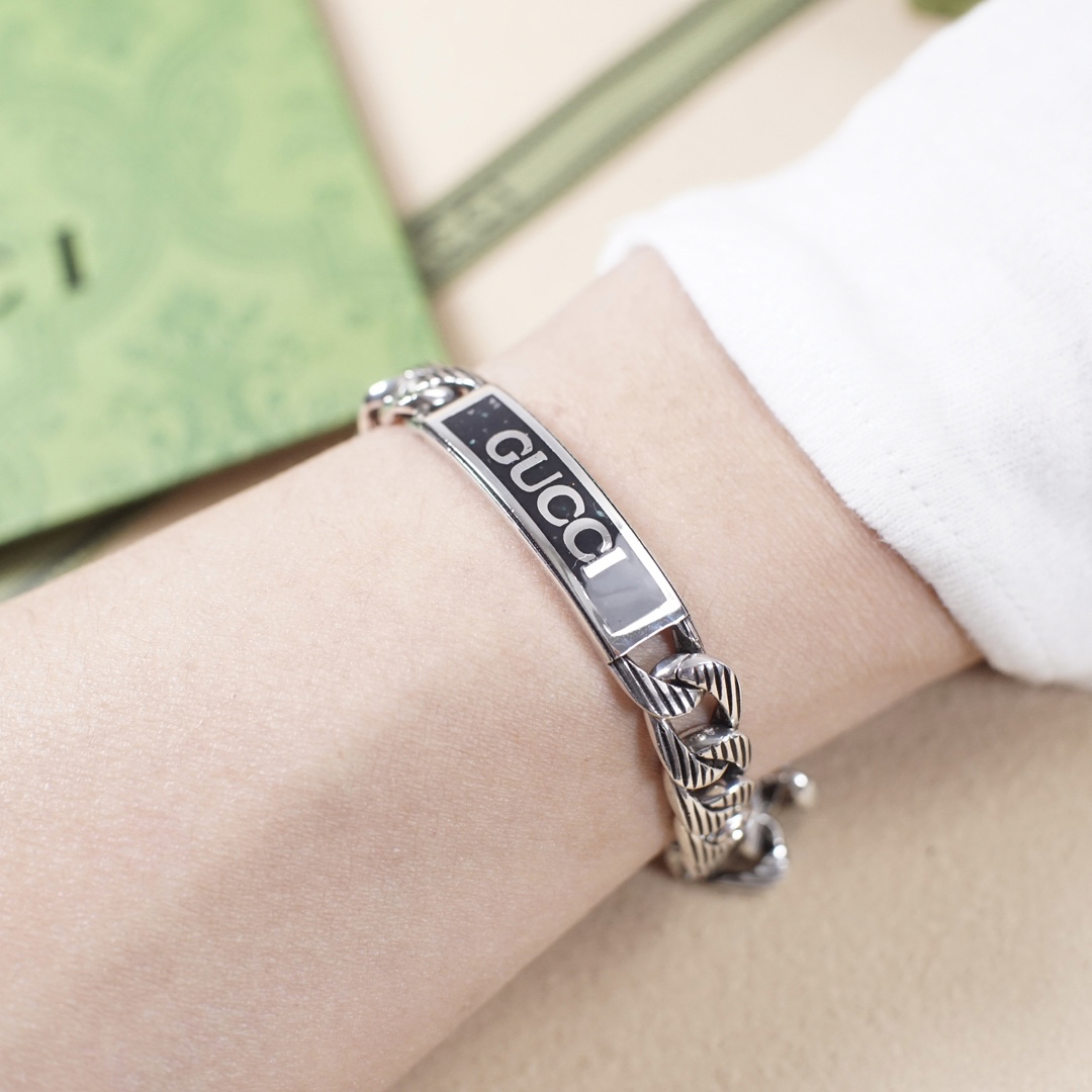 Gucci hand brand distressed bracelet