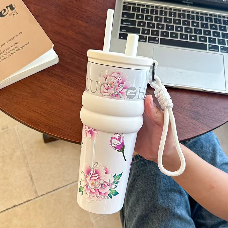 Floral pattern insulated water bottle, large capacity, stainless steel straw cup, perfect for use in the car or office.