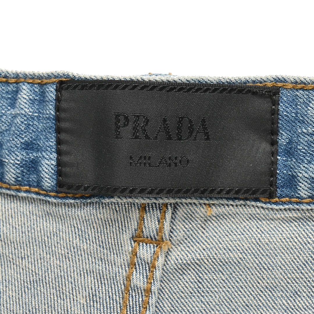 Prada washed jeans with embossed logo on back pocket