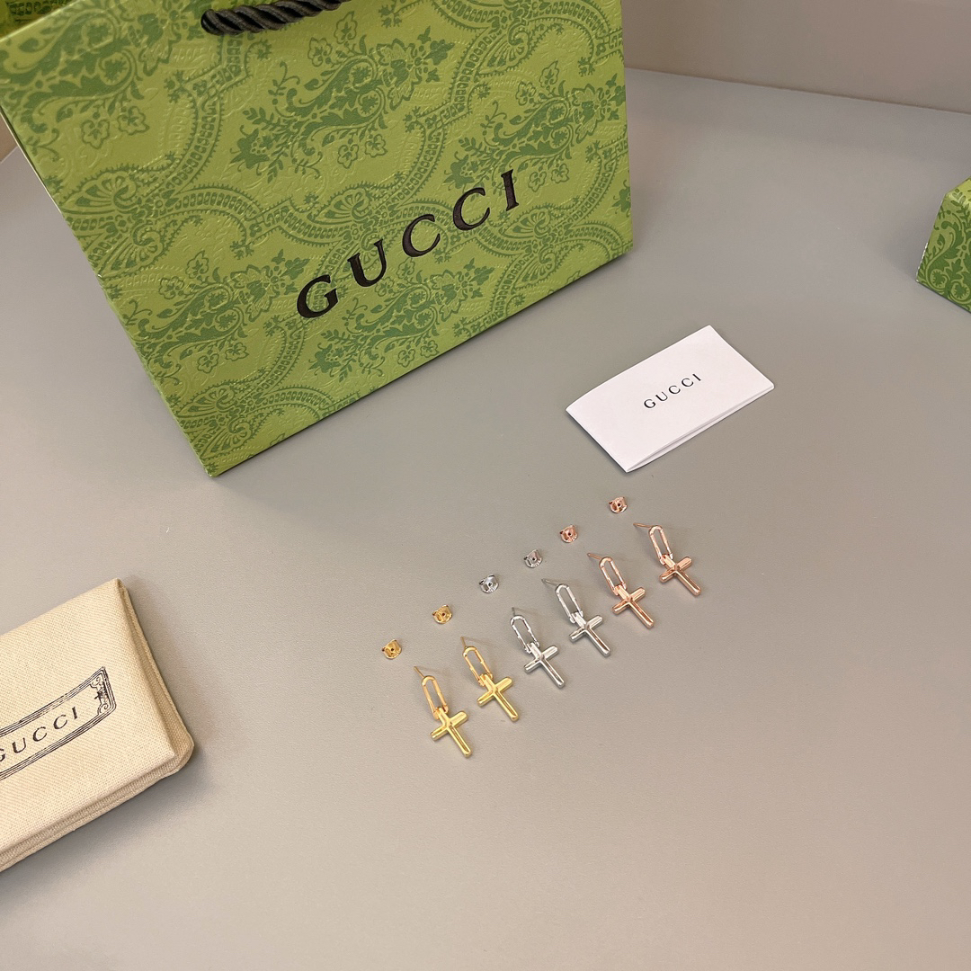 GUCCi cross earrings