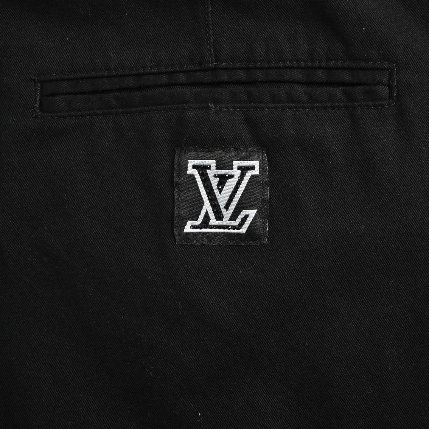 Louis Vuitton 25ss flared trousers with embroidered lettering on the back pockets