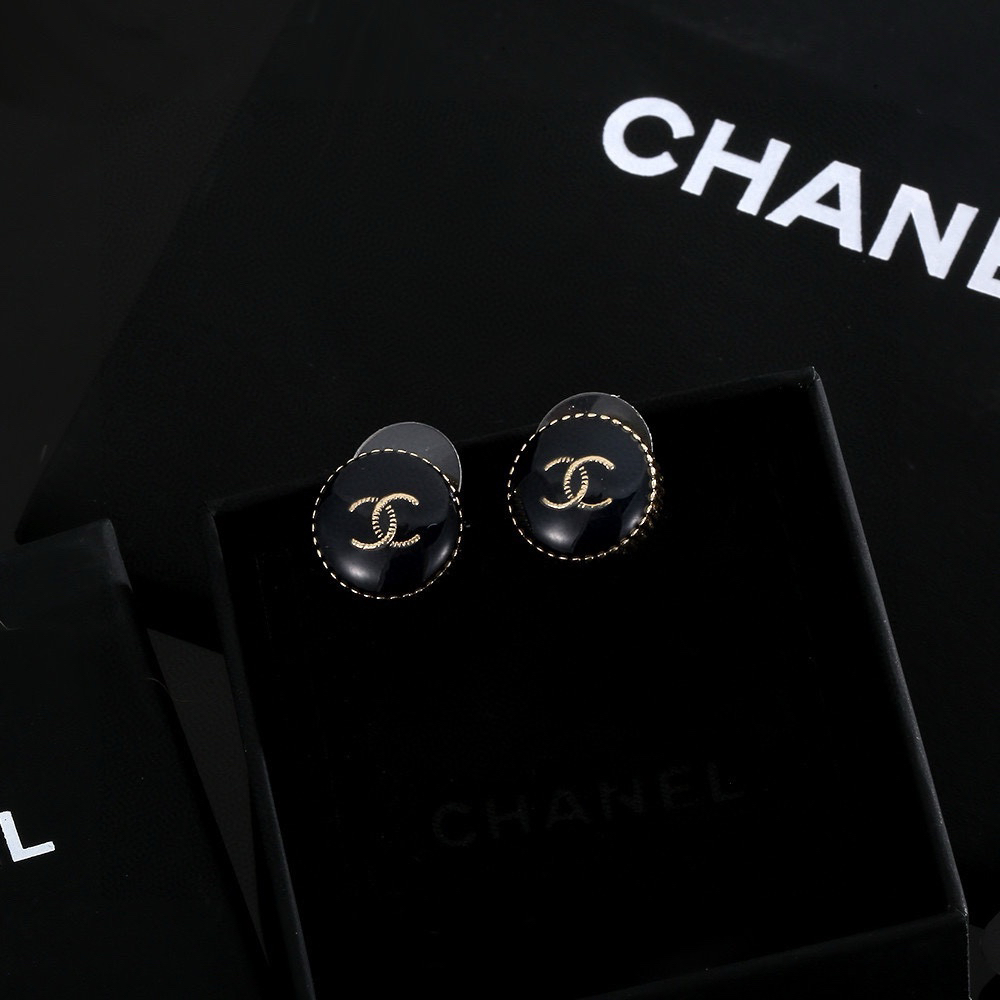 Chanel round black stud earrings